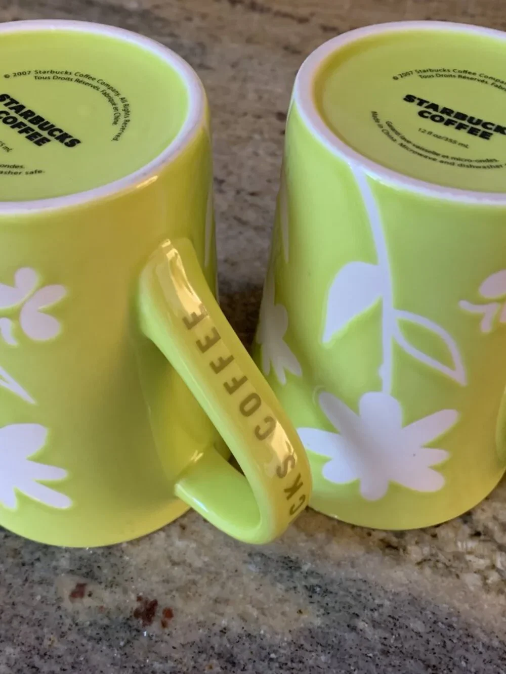Starbucks 2007 lime green ceramic coffee mug white etched flowers lot of 2 12 oz